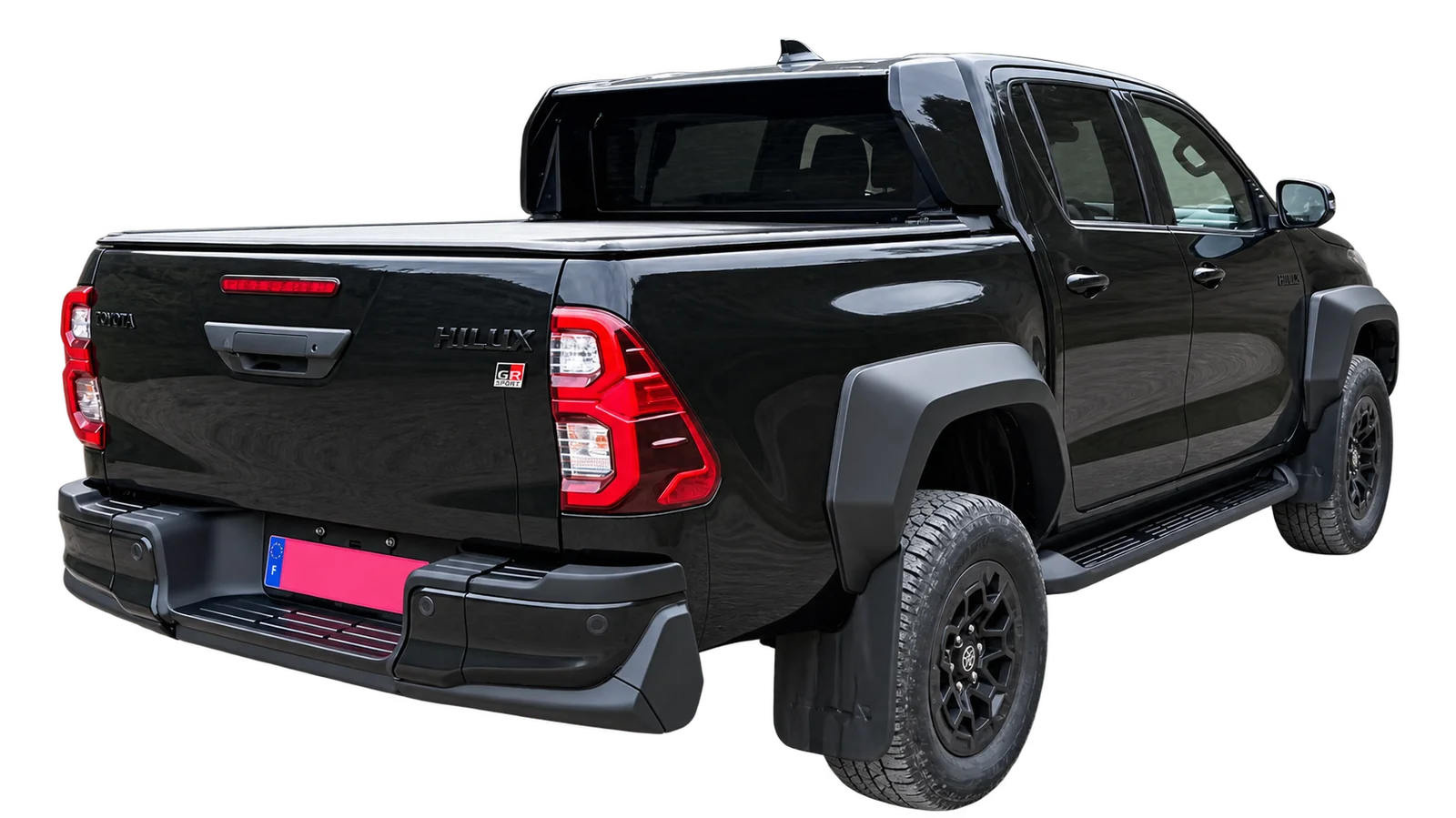 Toyota Hilux GR Sport noir, vue arrière trois quarts, sur fond blanc